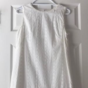 Sleeveless embroidered dress with back cutout